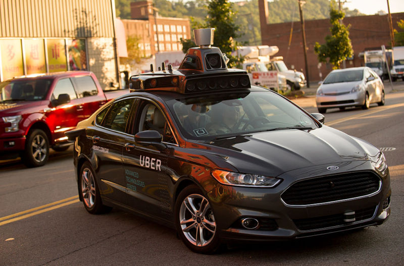 An Uber driverless Ford Fusion in Pittsburgh in 2016. Cars like this will soon be legal for commercial use in California.