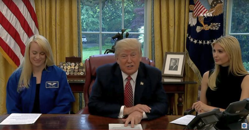 Flanked by NASA astronaut Kate Rubins, left, and his daughter, Ivanka Trump, right, President Donald Trump called the International Space Station on Monday.