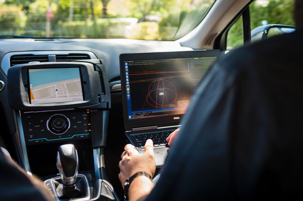 A technician sits in an Uber self-driving car on September 13, 2016 in Pittsburgh, Pennsylvania. 