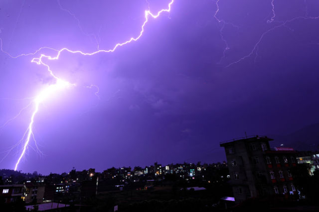 Lightning flashes illuminates the sky over during a thunderstorm over Panga, Kirtipur, Kathmandu, Nepal on Thursday, May 04, 2017.  