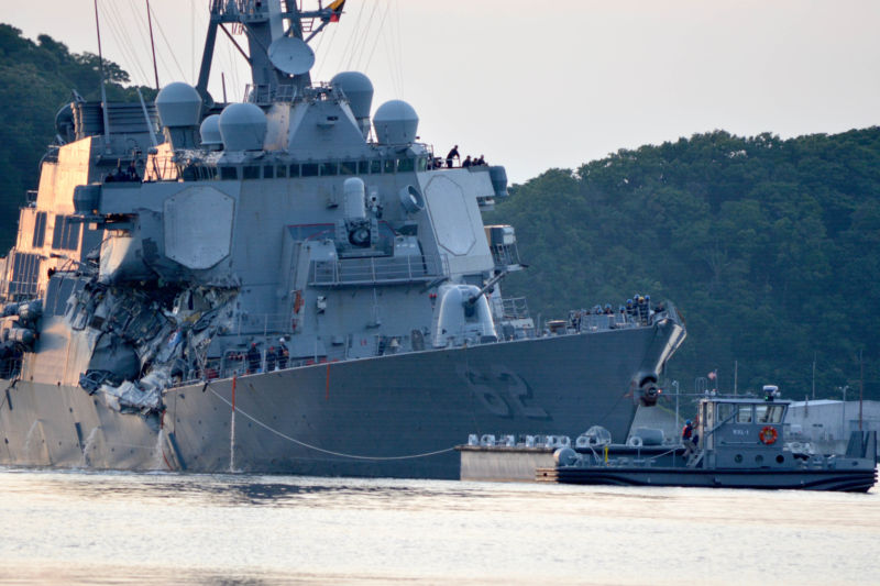 The Arleigh Burke-class guided-missile destroyer USS <em>Fitzgerald</em> (DDG 62) returns to Fleet Activities (FLEACT) Yokosuka following a collision with a merchant vessel while operating southwest of Yokosuka, Japan in June, 2017.