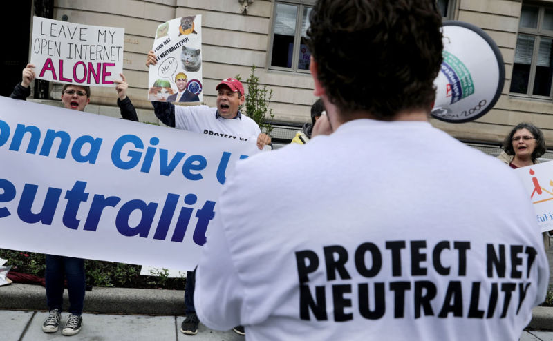Proponents of net neutrality protest against Federal Communication Commission Chairman Ajit Pai outside the American Enterprise Institute on May 5, 2017 in Washington, DC.