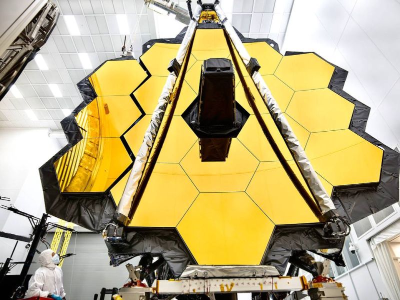 The towering primary mirror of NASA’s James Webb Space Telescope stands inside a cleanroom at NASA’s Johnson Space Center in Houston.