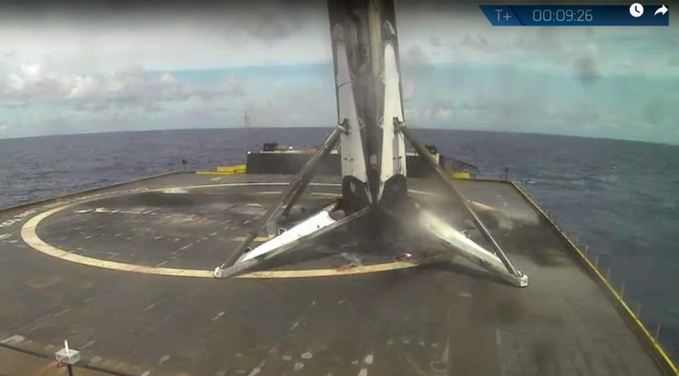 A webcast still of the Falcon 9 rocket first stage shortly after landing.