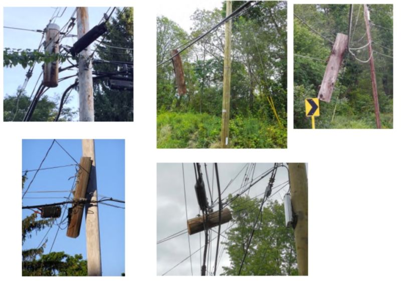 Dangling bits of old poles hanging off new poles, from a union complaint against Verizon in October 2015.