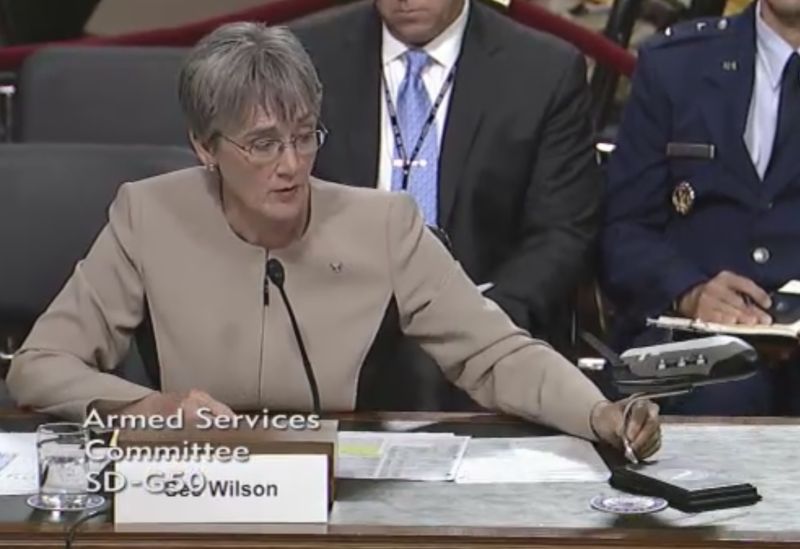 Air Force Secretary Heather Wilson shows a model of the X-37B during a hearing of the Senate Armed Services Committee. She has large sway in military space decisions.