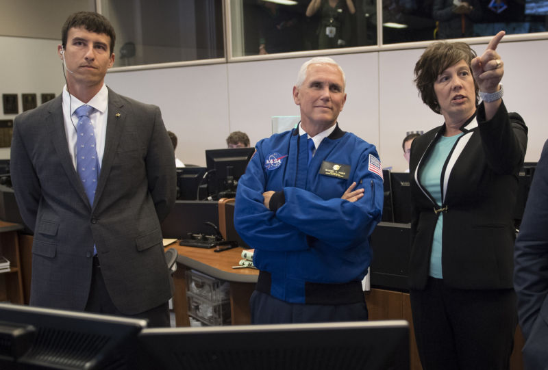 Vice President Mike Pence, center in Mission Control Houston, will oversee all space decisions made by the Trump administration. 