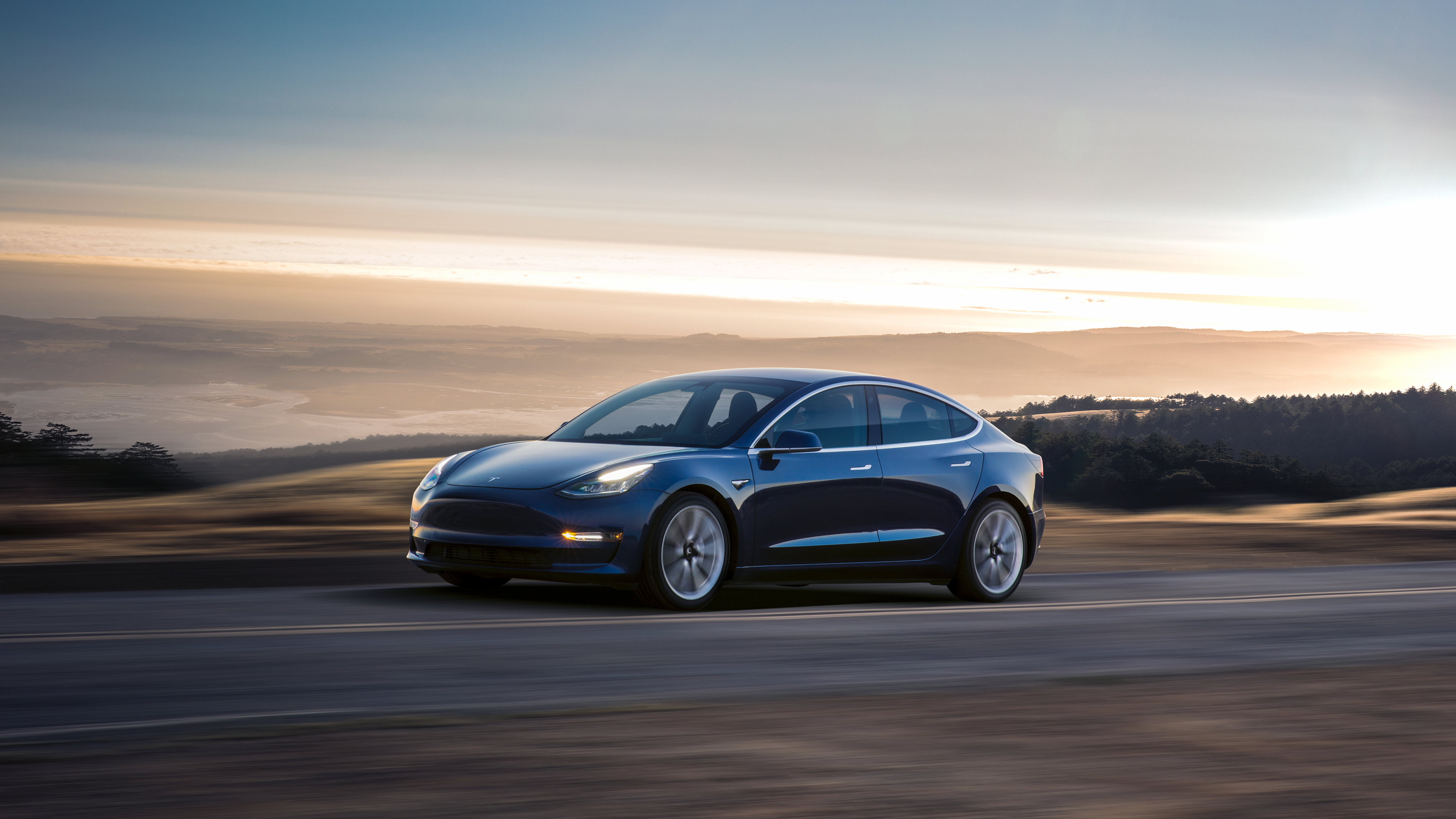 Pared-down electric experience: Driving one of the first Model 3s off the  line