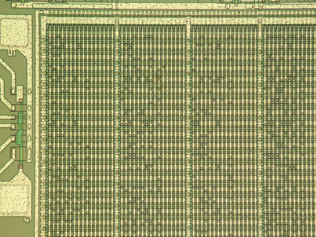 At 100x magnification, you can begin to see the individual bits and bytes that make up the raw code in this Mask ROM.