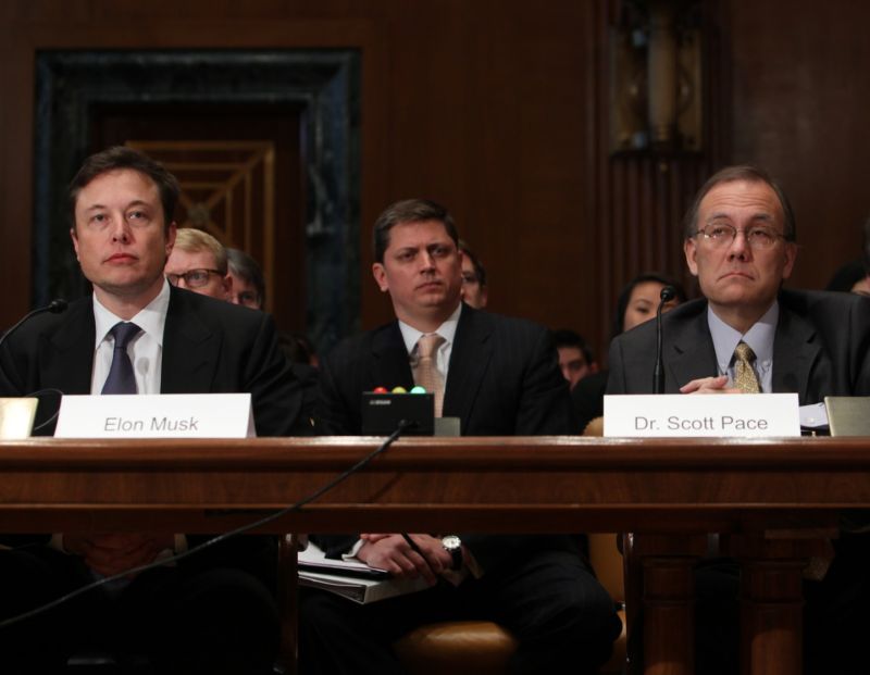 Scott Pace, right, and Elon Musk, left, testify before Congress in 2014.