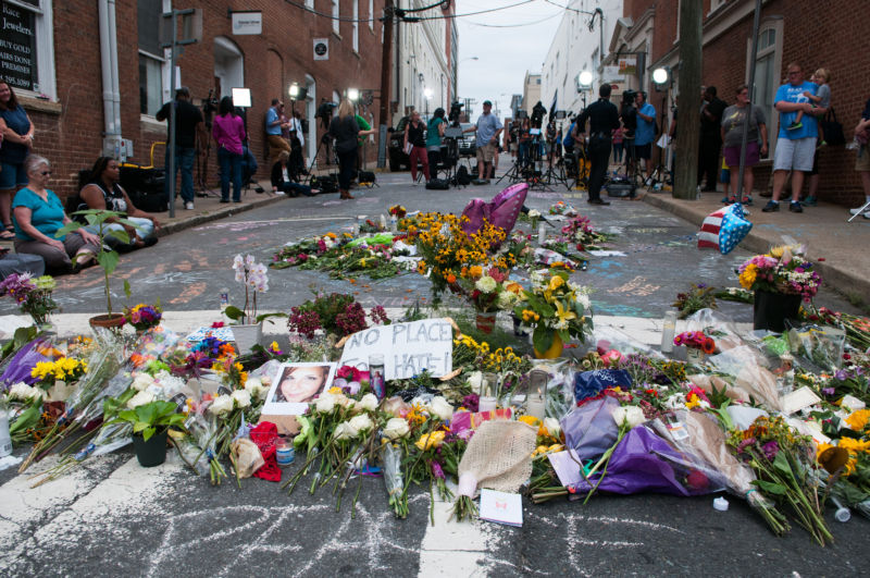 Flowers commemorate Heather Heyer, victim of the deadly car attack in Charlottesville.