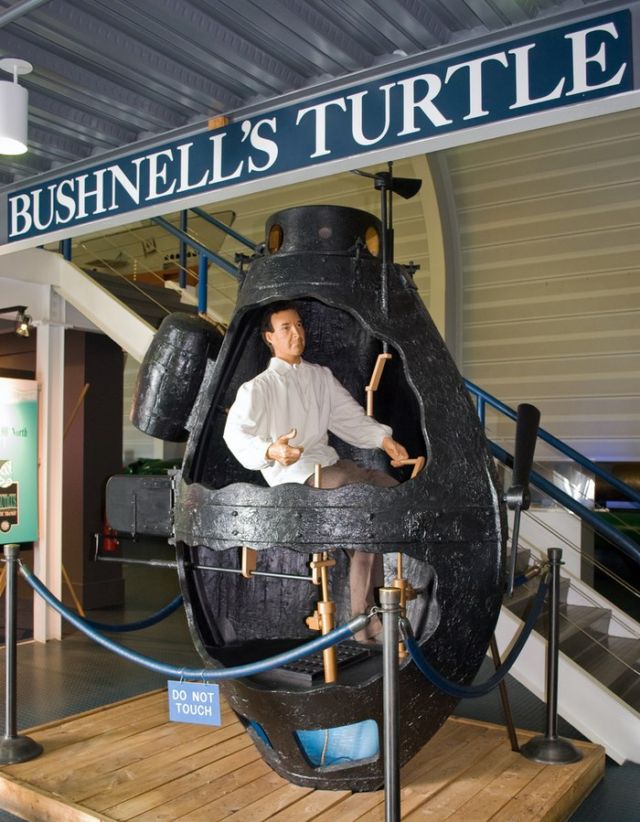 A full-sized mockup of the Bushnell "Turtle," the world's first military submarine used in action, at the US Navy Submarine Force Museum and Library, Groton Connecticut.