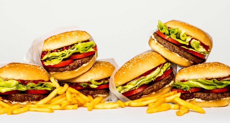 Promotional image of burgers and fries.