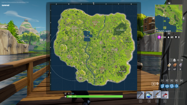<em>Fortnite</em>'s Battle Royale map, complete with marked landmarks and a visible "run here to a safe radius" marker.