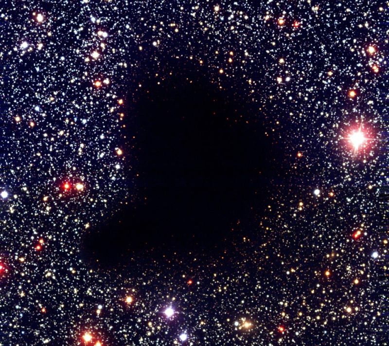No, that's not an oddly shaped black hole. It's a molecular cloud, which absorbs most wavelengths of light, making it hard to see what's inside.