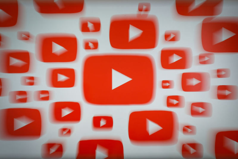 The YouTube Play button logo is duplicated multiple times on a white background.