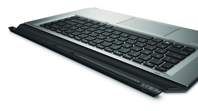 The keyboard is backlit. It uses a wired connection when attached to the tablet and Bluetooth when detached.