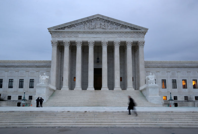 A man walks up the steps of the US Supreme Court on January 31, 2017 in Washington, DC.