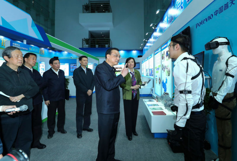 Chinese Premier Li Keqiang inspects the China Aerospace Science and Industry Corporation in Beijing on April 27, 2017.