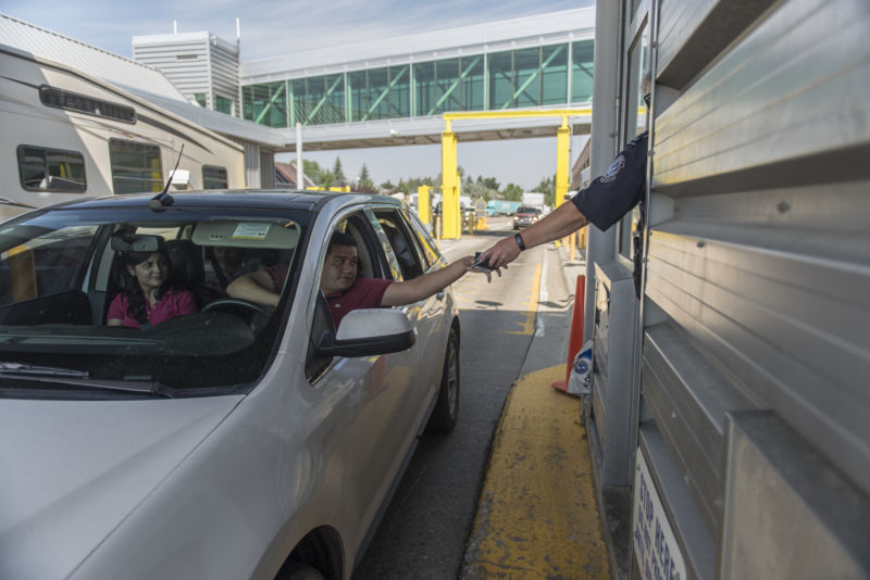 Automobiles entering the USA from Canada at the Customs and Border Protection Sweetgrass border crossing on Interstate 15 in Sweetgrass, Montana.