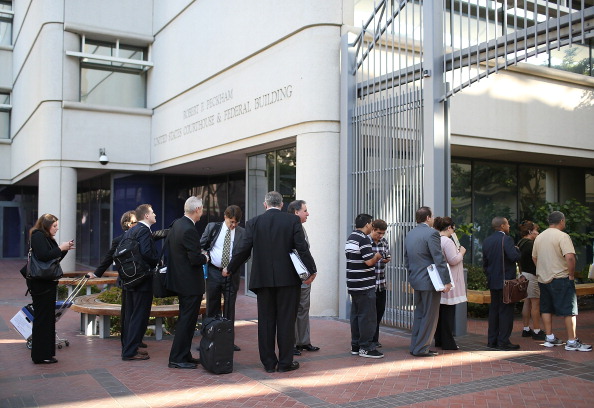 People line up to enter the federal courthouse in San Jose, California, in July 2012. It was the first day of trial in the patent battle between Apple and Samsung. 