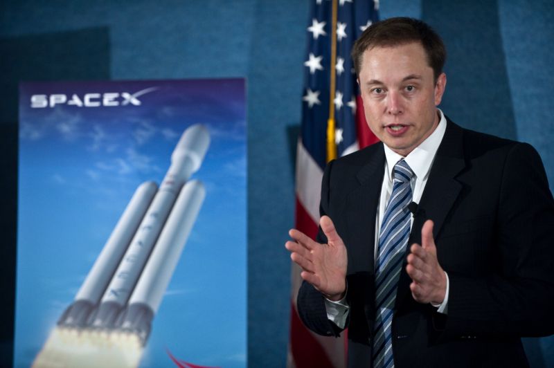 SpaceX CEO Elon Musk unveils the Falcon Heavy rocket at the National Press Club in Washington,DC on April 5, 2011.