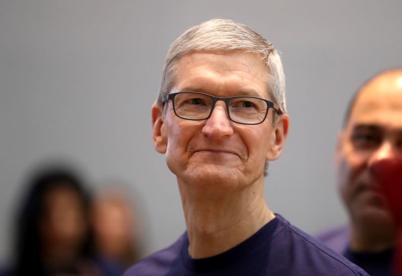 Apple CEO Tim Cook looks on as the iPhone X goes on sale at an Apple Store on November 3, 2017 in Palo Alto, California.