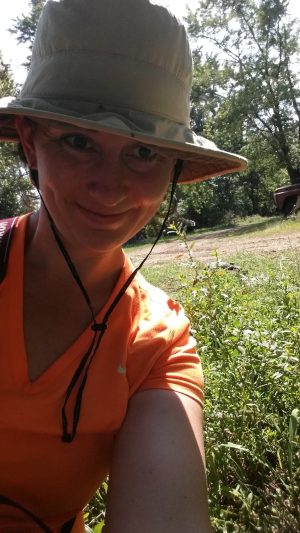 Archaeo-botanist Natalie Mueller with the first clump of wild erect knotweed she ever found.