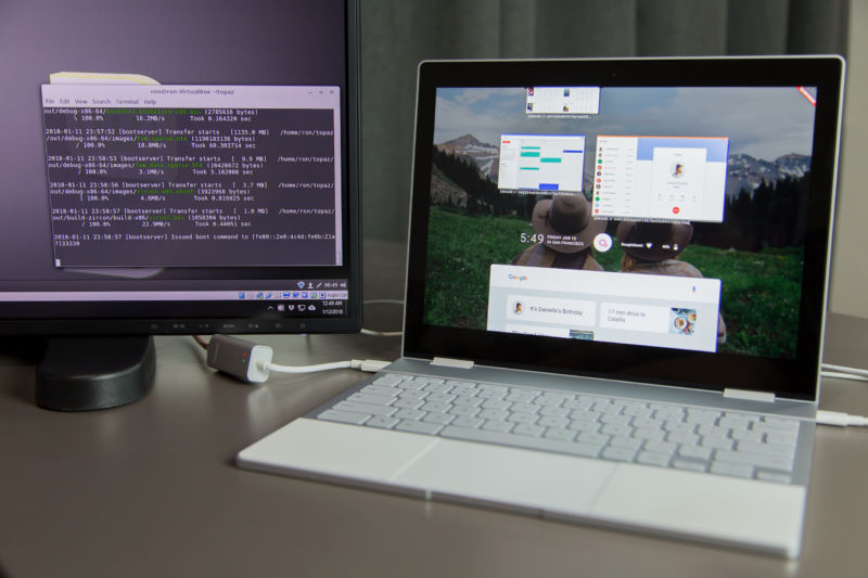 An external monitor sits next to a laptop computer.