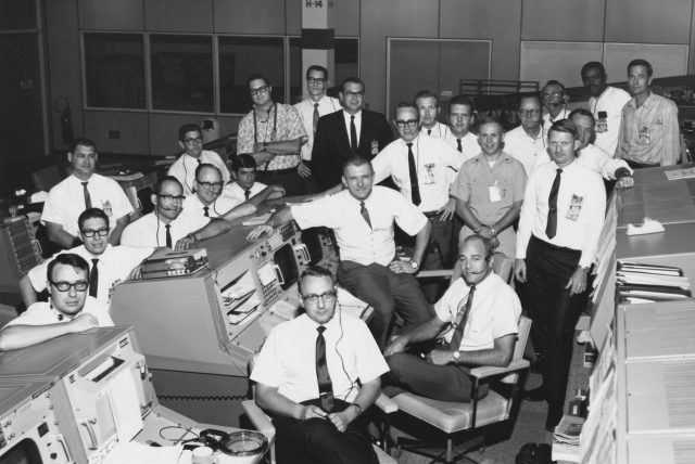 Glasses, skinny ties, pocket protectors, and short sleeves abound—these are the people who got America to the Moon.