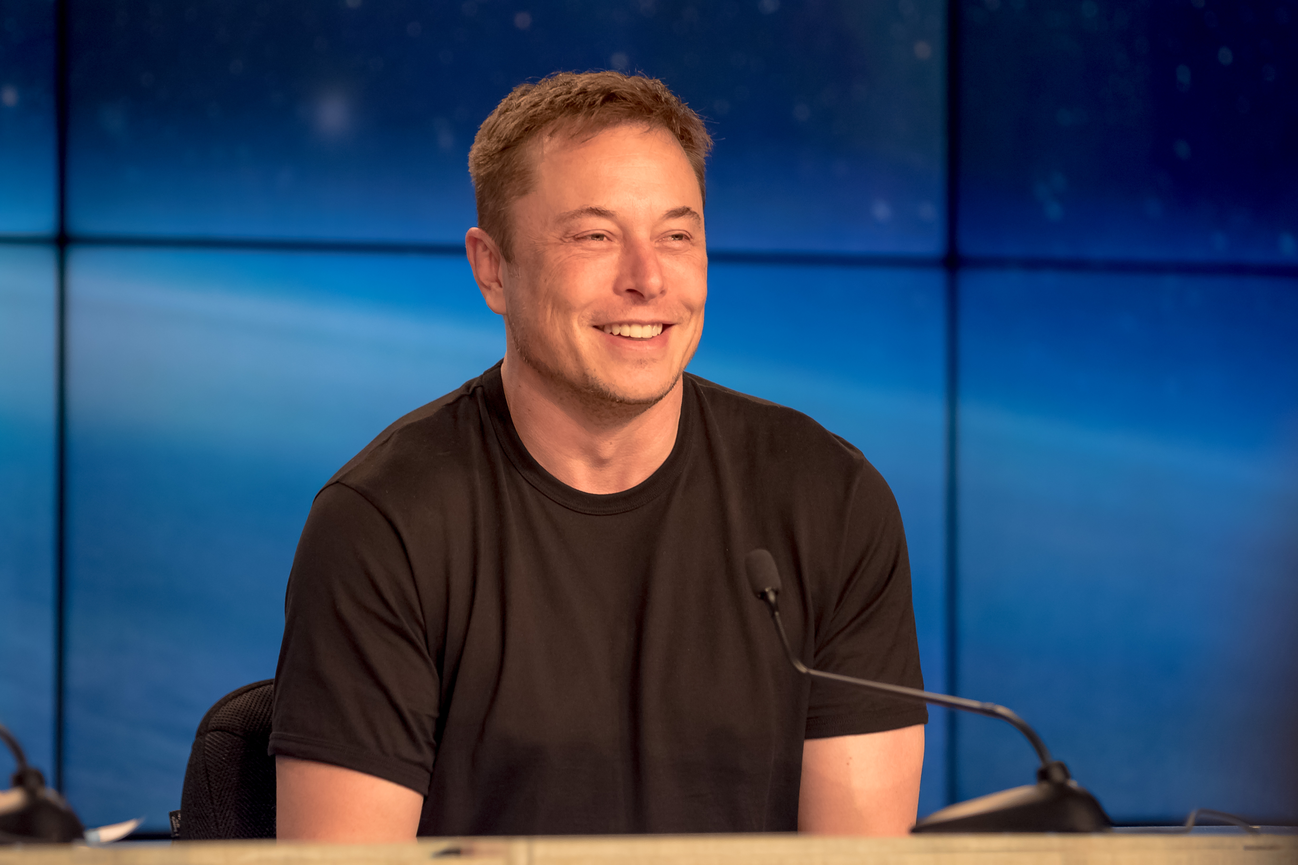 A happy Elon Musk on Tuesday evening.