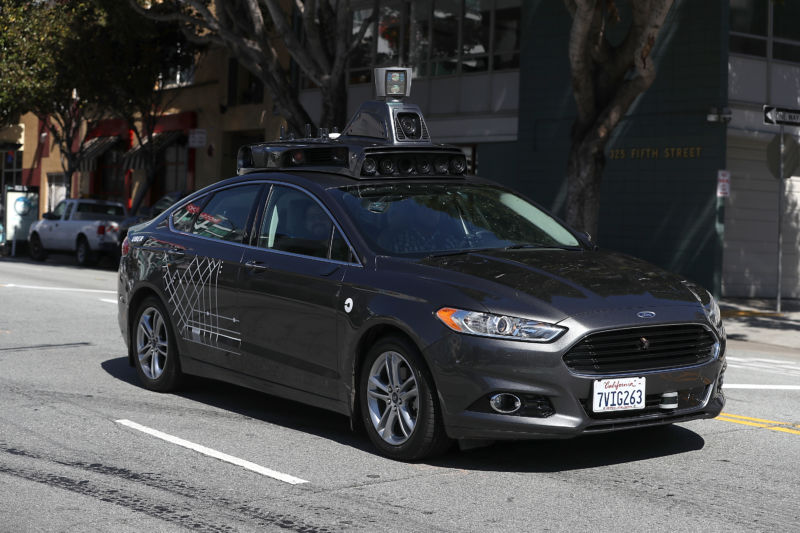 An Uber self-driving car drives down 5th Street on March 28, 2017 in San Francisco, California.