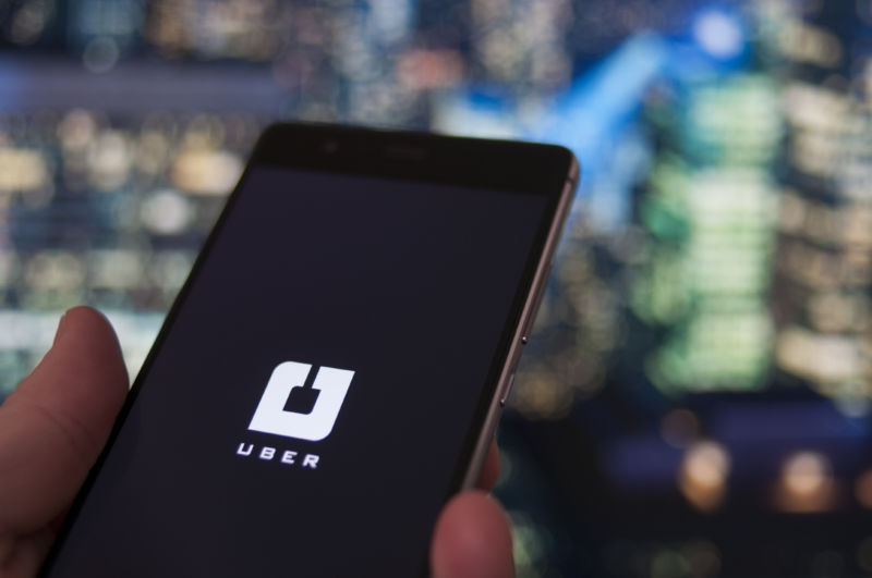 The Uber app is being used on a smartphone