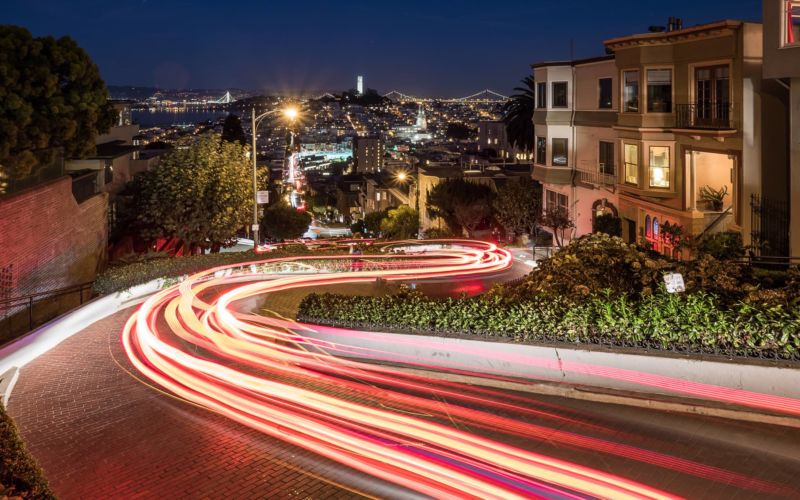 Lombard Street in San Francisco, with photoshopped laser beams on the street.