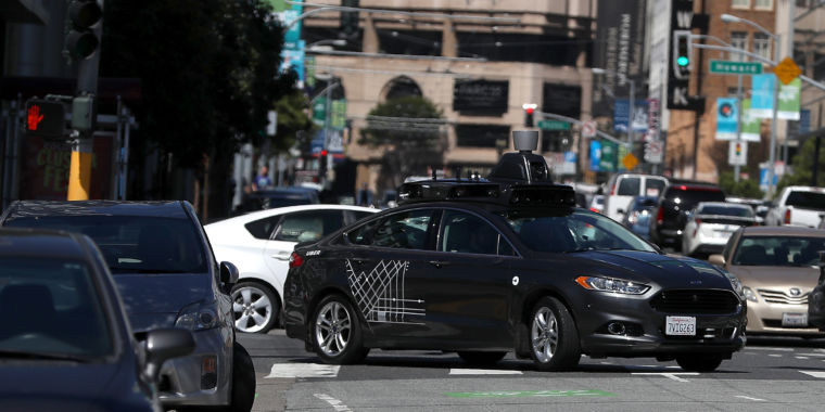 photo of Uber lays off 100 safety drivers as it scales back self-driving tests image