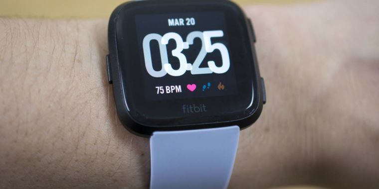 how do i change the time on my fitbit versa watch
