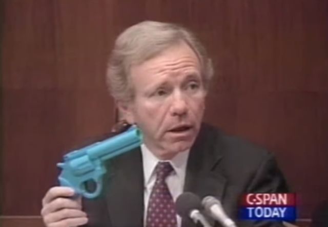 Senator Joe Lieberman (I-Conn.) holds a light gun during <a href="https://arstechnica.com/features/2017/08/night-traps-weird-path-from-congressional-crosshairs-to-2017-remastered-edition/">hearings on video game violence in 1993</a>, the first time the federal government addressed the issue.