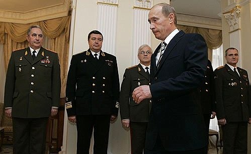 Vladimir Putin at an award ceremony at the Museum of the GRU, Russia's military intelligence agency. A GRU officer was reportedly behind the creation of the Guccifer 2.0 persona.