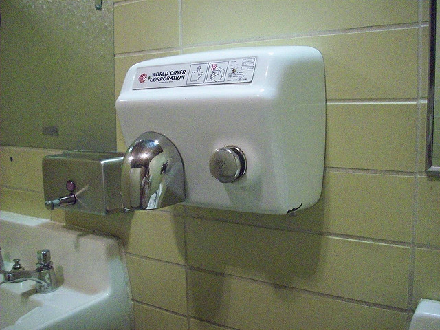 Hot air dryers suck in nasty bathroom bacteria and shoot them at