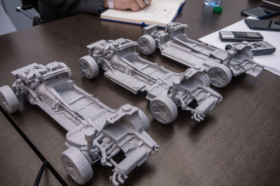 These 3D-printed models illustrate BMW's future vehicle architecture that will allow it to use any powertrain in any new model. The model on the left uses an internal combustion engine. In the middle is a plug-in hybrid EV, and on the right is a BEV. (In both cases the models only show a portion of the battery pack, BMW is not planning on building lop-sided PHEVs and BEVs!)