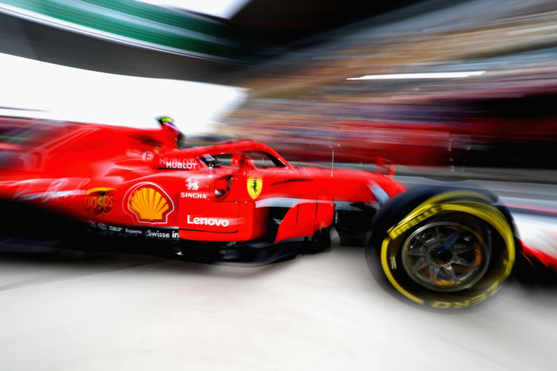 SHANGHAI, CHINA - APRIL 13: Kimi Raikkonen of Finland driving the (7) Scuderia Ferrari SF71H leaves the garage during practice for the Formula One Grand Prix of China at Shanghai International Circuit on April 13, 2018 in Shanghai, China.  