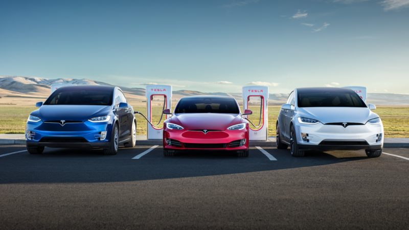 Three Telsa electric vehicles