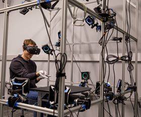 On Monday, Oculus chief scientist Michael Abrash posted this image of Facebook CEO Mark Zuckerberg testing <em>something</em> at what was formerly known as Oculus Research. Now, these tests take place at Facebook Reality Labs.