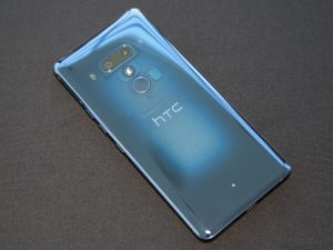 HTC's new flagship smartphone has a translucent back, dual front cameras -  Ars Technica