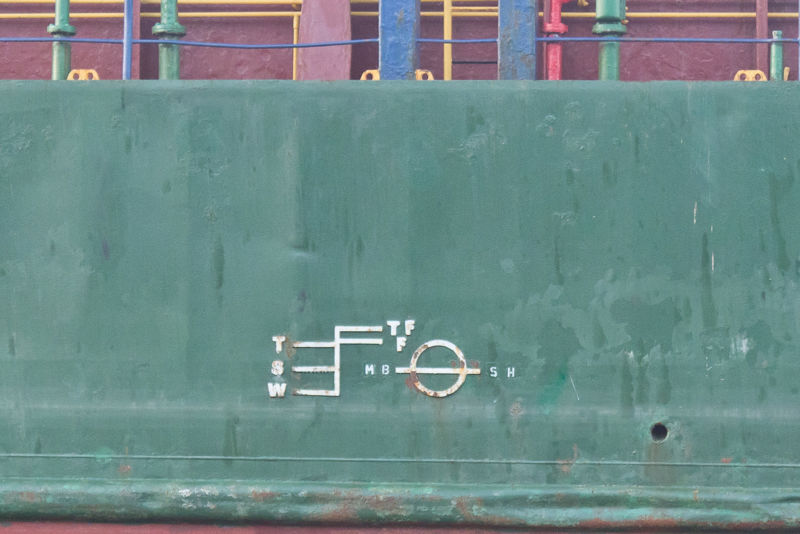 Markings on the side of an ocean vessel