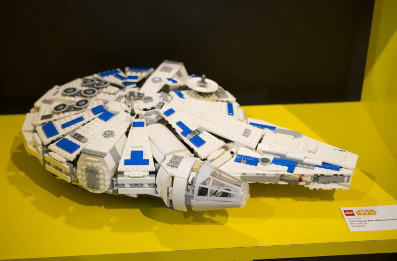 LEGO Kessel Run Millenium Falcon completed set sitting on a yellow table.