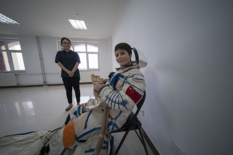 ESA astronaut Samantha Cristoforetti in a Chinese pressure suit during training with Chinese colleagues to practice sea survival off China’s coastal city of Yantai, on August 14, 2017.