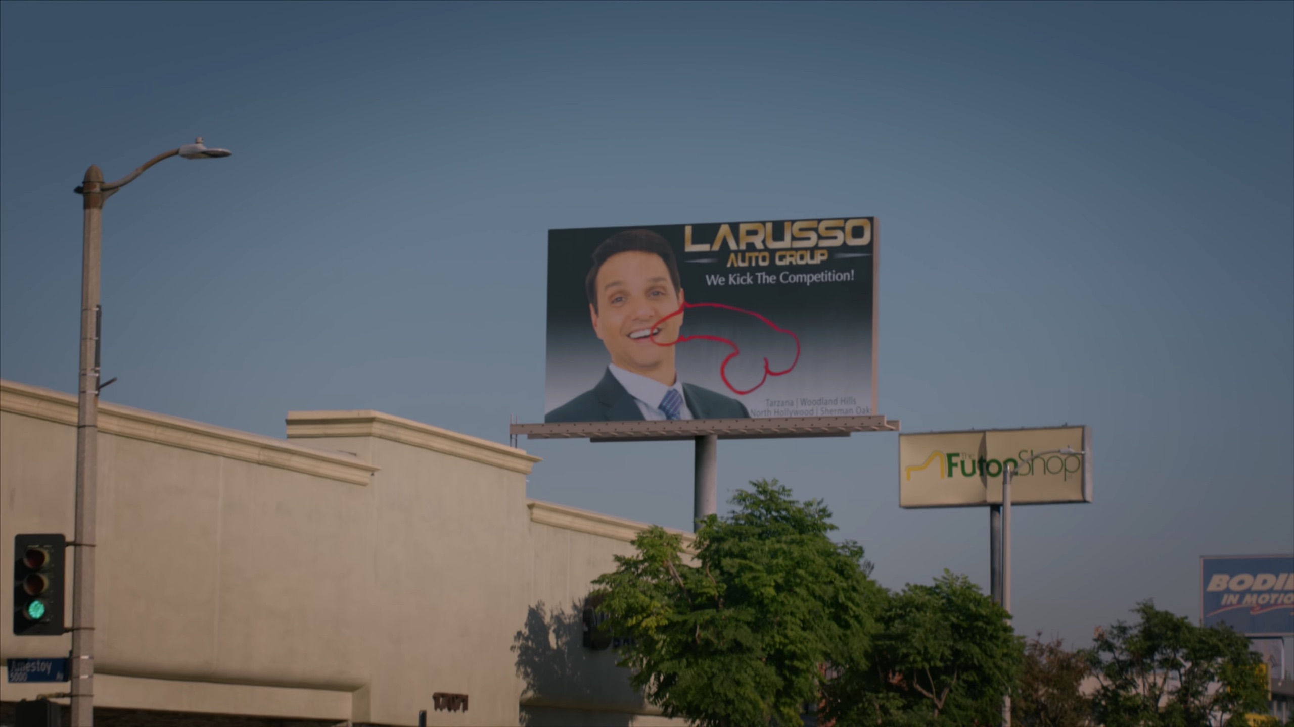 Billboard of LaRusso has been vandalized with a phallus.