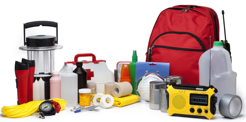 This is a photo of a variety of Emergency Supplies isolated on a white background.