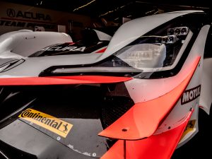 The headlight on a Penske Acura race car